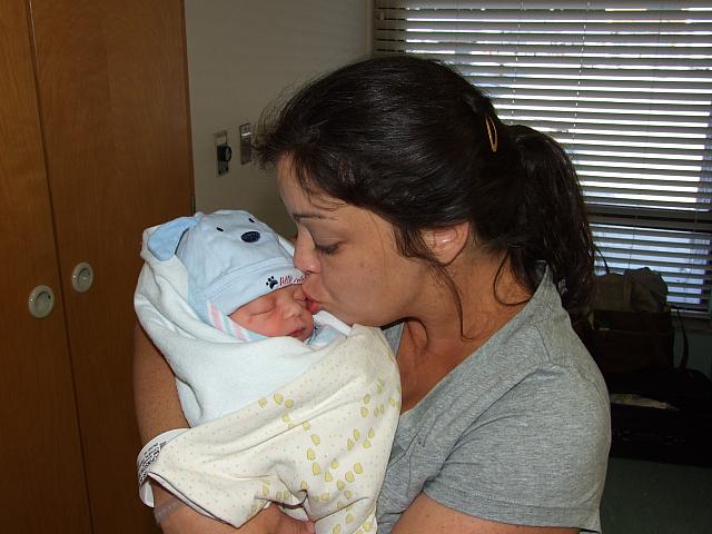 Kelly giving Jonah a kiss