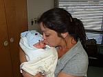Kelly giving Jonah a kiss